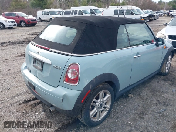 2013 MINI Convertible z VIN WMWZN3C53DT135427, wystawiony jako IAAI lot #41954817 z przebiegiem 57 029 mil mil oraz . Historia ofert i sprzedaży dostępna na DreamBid. Obrazek 4.
