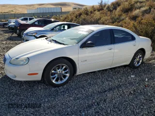 2001 Chrysler LHS z VIN 2C3AC56GX1H547856, wystawiony jako Copart lot #77842124 z przebiegiem 97 378 mil mil oraz Tytuł czysty. Historia ofert i sprzedaży dostępna na DreamBid. Obrazek 1.