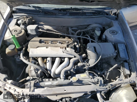 1999 Toyota Corolla VE with VIN 1NXBR12E9XZ158252, listed as a Copart auction lot 58757595 with 232,776 mi miles and Salvage title. Bid and sale history available at DreamBid. Image 11.