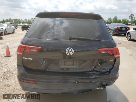 2018 Volkswagen Tiguan S with VIN 3VV1B7AX9JM020833, listed as a Copart auction lot 54539565 with 69,904 mi miles and Salvage title. Bid and sale history available at DreamBid. Image 6.