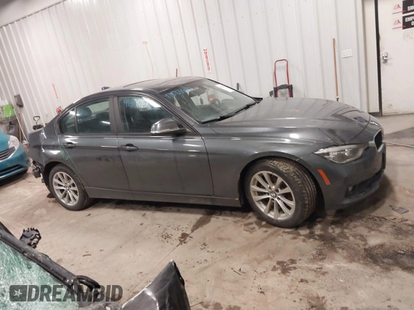 2018 BMW 3 Series 320i xDrive with VIN WBA8E5G50JNU48047, listed as a IAAI auction lot 41564022 with 69,971 mi miles. Bid and sale history available at carsss.com. Image 13.