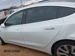 2020 Tesla Model 3 Standard Range Plus with VIN 5YJ3E1EA1LF738062, listed as a IAAI auction lot 41747581 with 41,897 mi miles. Bid and sale history available at carsss.com. Image 13.