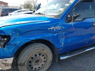2014 Ford F-150 XL with VIN 1FTFW1CF4EKF14279, listed as a IAAI auction lot 42006454 with 104,648 mi miles. Bid and sale history available at carsss.com. Image 6.