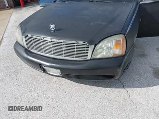 2002 Cadillac DeVille DHS z VIN 1G6KE57Y62U233642, wystawiony jako IAAI lot #42132517 z przebiegiem 223 505 mil mil oraz . Historia ofert i sprzedaży dostępna na DreamBid. Obrazek 6.