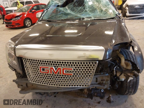 2015 GMC Terrain Denali z VIN 2GKFLZE3XF6419468, wystawiony jako IAAI lot #41455635 z przebiegiem Nie podano mil oraz . Historia ofert i sprzedaży dostępna na DreamBid. Obrazek 12.