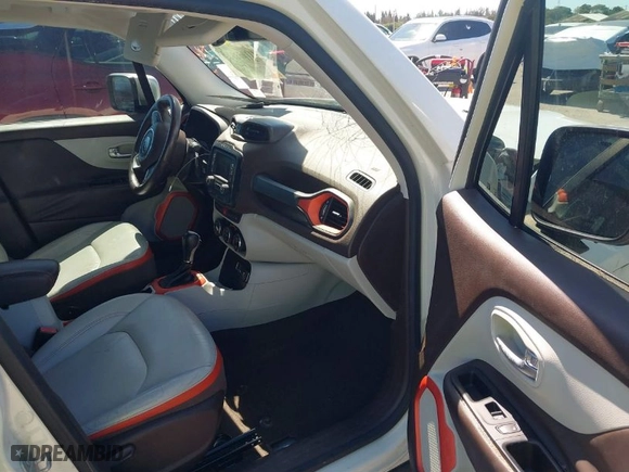 2015 Jeep Renegade Limited with VIN ZACCJADTXFPC18471, listed as a IAAI auction lot 41698973 with 77,033 mi miles. Bid and sale history available at carsss.com. Image 5.