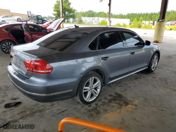 2015 Volkswagen Passat 1.8T Sport with VIN 1VWBT7A35FC009590, listed as a Copart auction lot 69564634 with 61,959 mi miles and Salvage Title. Bid and sale history available at carsss.com. Image 3.