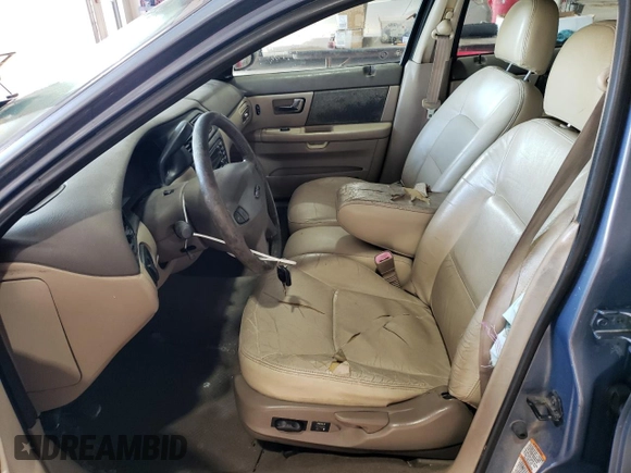 2001 Ford Taurus SE Standard with VIN 1FAHP58S71G184725, listed as a Copart auction lot 56401895 with 163,238 mi miles and Salvage title. Bid and sale history available at DreamBid. Image 7.