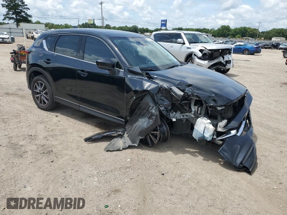 2018 Mazda CX-5 Grand Touring с VIN JM3KFBDM0J0362967, выставлен на аукционе Copart как лот 60288665 с пробегом 137 241 миль миль и Списание • Salvage title. История ставок и продаж доступна на DreamBid. Изображение 4.