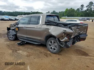 2020 Honda Ridgeline RTL-E with VIN 5FPYK3F79LB001891, listed as a Copart auction lot 58569255 with 34,513 mi miles and Salvage title. Bid and sale history available at DreamBid. Image 2.