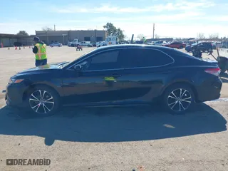 2018 Toyota Camry LE with VIN JTNB11HKXJ3071137, listed as a IAAI auction lot 41699856 with 102,310 mi miles. Bid and sale history available at carsss.com. Image 14.
