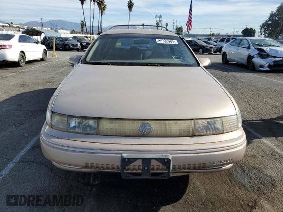 1993 Mercury Sable z VIN 1MELM5849PA655685, wystawiony jako Copart lot #85732984 z przebiegiem 98 081 mil mil oraz Tytuł czysty. Historia ofert i sprzedaży dostępna na DreamBid. Obrazek 5.