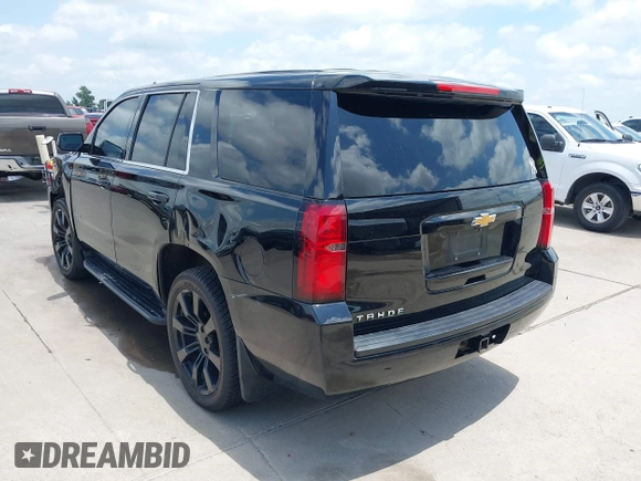 2015 Chevrolet Tahoe with VIN 1GNSK2KC4FR610534, listed as a IAAI auction lot 42357319 with 140,479 mi miles and . Bid and sale history available at DreamBid. Image 3.