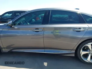 2019 Honda Accord Touring with VIN 1HGCV2F92KA004825, listed as a IAAI auction lot 41974555 with 74,464 mi miles and . Bid and sale history available at DreamBid. Image 14.