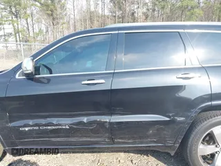 2014 Jeep Grand Cherokee Overland with VIN 1C4RJECG4EC197433, listed as a IAAI auction lot 41769932 with 198,568 mi miles. Bid and sale history available at carsss.com. Image 14.