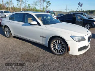 2014 BMW 7 Series ALPINA B7 with VIN WBAYE8C59ED134562, listed as a IAAI auction lot 41806222 with 120,043 mi miles. Bid and sale history available at carsss.com. Image 1.