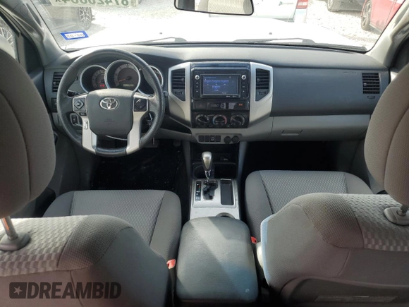 2014 Toyota Tacoma PreRunner with VIN 3TMKU4HN7EM040312, listed as a Copart auction lot 87420864 with 68,853 mi miles and Salvage title. Bid and sale history available at DreamBid. Image 8.