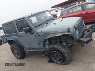 2015 Jeep Wrangler Sport with VIN 1C4GJWAG7FL585631, listed as a IAAI auction lot 41943582 with 88,649 mi miles and . Bid and sale history available at DreamBid. Image 13.