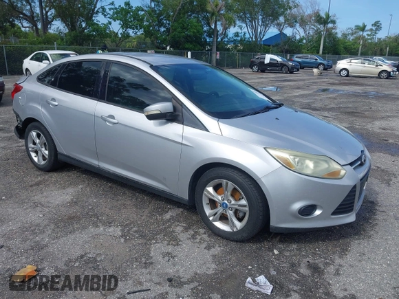 2013 Ford Focus SE with VIN 1FADP3F28DL217636, listed as a IAAI auction lot 42465123 with 187,088 mi miles and . Bid and sale history available at DreamBid. Image 1.