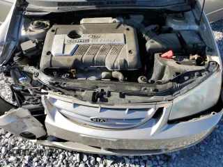 2006 Kia Spectra EX z VIN KNAFE121265353582, wystawiony jako Copart lot #52747635 z przebiegiem 99 087 mil mil oraz Szkoda całkowita • Salvage title. Historia ofert i sprzedaży dostępna na DreamBid. Obrazek 12.