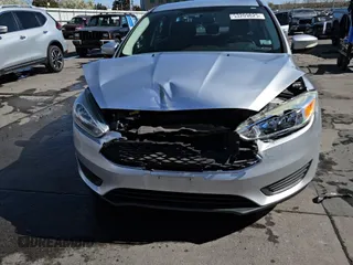 2017 Ford Focus SE with VIN 1FADP3F2XHL277097, listed as a Copart auction lot 53209825 with 100,384 mi miles and Salvage Title. Bid and sale history available at carsss.com. Image 13.