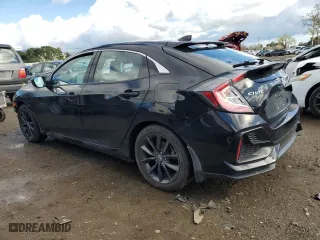 2021 Honda Civic Hatchback EX with VIN SHHFK7H61MU405926, listed as a Copart auction lot 49112195 with 61,967 mi miles and Salvage Title. Bid and sale history available at carsss.com. Image 2.