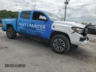 2023 Toyota Tacoma SR with VIN 3TMCZ5AN2PM577873, listed as a Copart auction lot 57361315 with 50,110 mi miles and Salvage title. Bid and sale history available at DreamBid. Image 4.