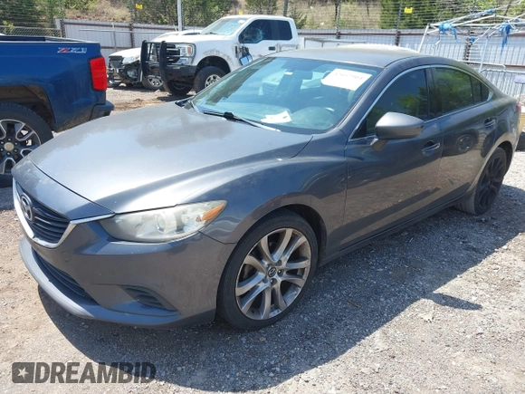 2014 Mazda Mazda6 i Touring with VIN JM1GJ1V6XE1154862, listed as a IAAI auction lot 42052904 with 301,752 mi miles. Bid and sale history available at carsss.com. Image 2.