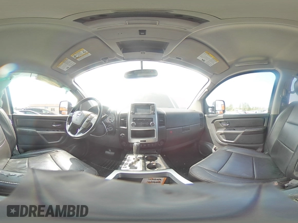 2015 Nissan Titan Pro-4X with VIN 1N6BA0EC1FN507894, listed as a Copart auction lot 65784274 with 147,576 mi miles and Salvage title. Bid and sale history available at DreamBid. Image 12.