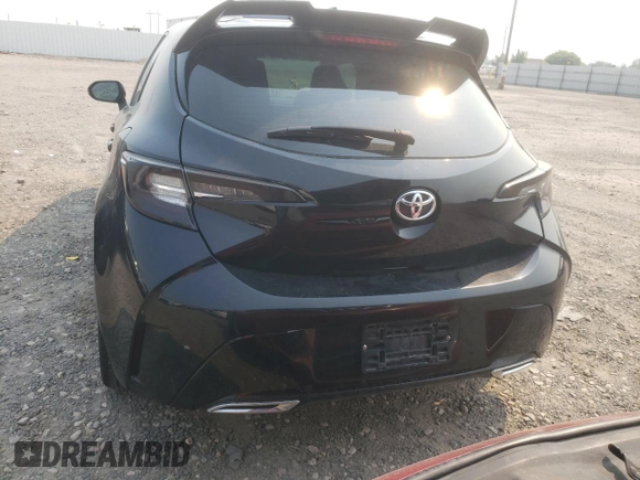 2019 Toyota Corolla Hatchback SE with VIN JTNK4RBE5K3063487, listed as a Copart auction lot 69667404 with 92,050 mi miles and Salvage Title. Bid and sale history available at carsss.com. Image 6.