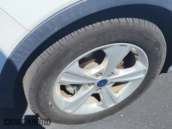 2016 Ford Escape SE z VIN 1FMCU0GX3GUC30456, wystawiony jako IAAI lot #42387320 z przebiegiem 99 033 mil mil oraz . Historia ofert i sprzedaży dostępna na DreamBid. Obrazek 13.