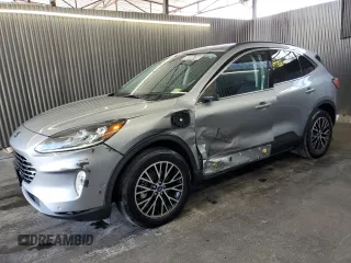 2021 Ford Escape Titanium Plug-In Hybrid with VIN 1FMCU0LZ8MUA66995, listed as a Copart auction lot 60986765 with 69,609 mi miles and Clean title. Bid and sale history available at DreamBid. Image 1.