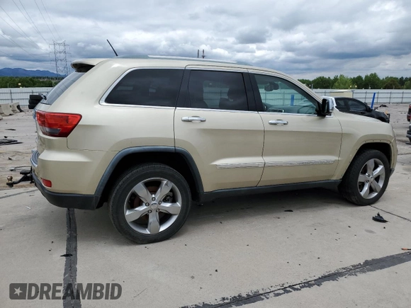 2011 Jeep Grand Cherokee Limited z VIN 1J4RR5GT1BC590599, wystawiony jako Copart lot #58657915 z przebiegiem 103 897 mil mil oraz Czysty tytuł • Clean title. Historia ofert i sprzedaży dostępna na DreamBid. Obrazek 3.