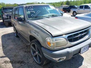 2000 Ford Explorer XLT z VIN 1FMZU63E0YZC65266, wystawiony jako IAAI lot #42004786 z przebiegiem 273 397 mil mil oraz . Historia ofert i sprzedaży dostępna na DreamBid. Obrazek 1.