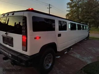 2004 Hummer H2 with VIN 5GRGN23U34H116910, listed as a Copart auction lot 76343914 with 186,685 mi miles and Clean Title. Bid and sale history available at carsss.com. Image 4.