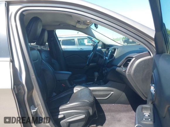 2019 Jeep Cherokee Latitude Plus with VIN 1C4PJMLBXKD233749, listed as a IAAI auction lot 41937698 with 103,988 mi miles and . Bid and sale history available at DreamBid. Image 5.