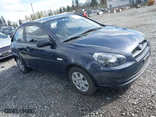 2011 Hyundai Accent GS with VIN KMHCM3AC0BU194435, listed as a IAAI auction lot 41993092 with 56,891 mi miles. Bid and sale history available at carsss.com. Image 1.