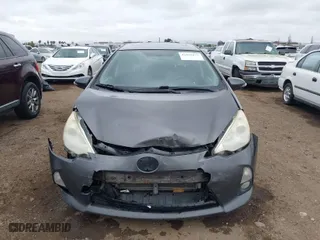 2012 Toyota Prius c One with VIN JTDKDTB35C1015243, listed as a IAAI auction lot 41692077 with 304,394 mi miles. Bid and sale history available at carsss.com. Image 6.