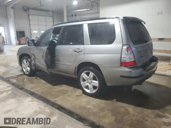 2007 Subaru Forester Sports XT with VIN JF1SG696X7H725959, listed as a Copart auction lot 86597334 with 56,997 mi miles and Salvage Title. Bid and sale history available at carsss.com. Image 2.