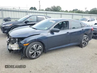 2016 Honda Civic EX-L with VIN 19XFC1F72GE011210, listed as a Copart auction lot 57452205 with 124,436 mi miles and Salvage title. Bid and sale history available at DreamBid. Image 1.