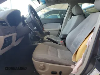 2012 Ford Fusion SE z VIN 3FAHP0HAXCR231865, wystawiony jako Copart lot #52644815 z przebiegiem 153 058 mil mil oraz Szkoda całkowita • Salvage title. Historia ofert i sprzedaży dostępna na DreamBid. Obrazek 7.