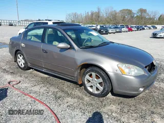 2003 Nissan Altima S with VIN 1N4AL11DX3C228986, listed as a IAAI auction lot 41767378 with 185,362 mi miles. Bid and sale history available at carsss.com. Image 1.