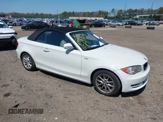 2010 BMW 1 Series 128i with VIN WBAUL7C53AVJ77801, listed as a IAAI auction lot 42048295 with 152,176 mi miles and . Bid and sale history available at carsss.com. Image 1.