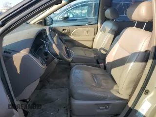2002 Toyota Sienna LE with VIN 4T3ZF13C52U458553, listed as a Copart auction lot 77957754 with 164,058 mi miles and Salvage Title. Bid and sale history available at carsss.com. Image 7.