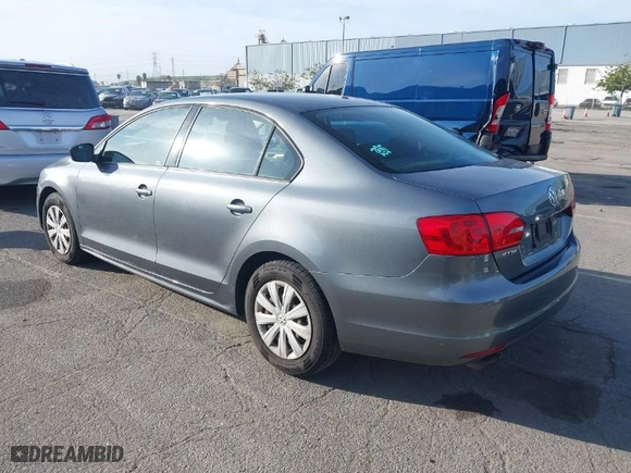 2014 Volkswagen Jetta Sedan S with VIN 3VW2K7AJ1EM290446, listed as a IAAI auction lot 41851440 with 115,291 mi miles. Bid and sale history available at carsss.com. Image 3.