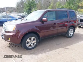 2011 Honda Pilot EX-L with VIN 5FNYF4H58BB001023, listed as a IAAI auction lot 42081793 with 171,062 mi miles and . Bid and sale history available at carsss.com. Image 20.