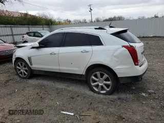 2013 Cadillac SRX Performance Collection with VIN 3GYFNHE36DS556237, listed as a Copart auction lot 79465054 with 157,276 mi miles and Clean Title. Bid and sale history available at carsss.com. Image 2.
