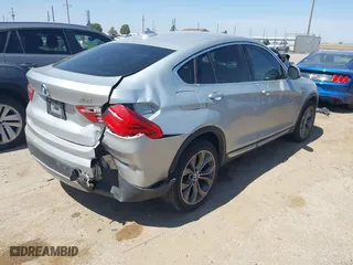 2016 BMW X4 xDrive35i with VIN 5UXXW5C50G0N91649, listed as a IAAI auction lot 41897744 with 92,619 mi miles. Bid and sale history available at carsss.com. Image 4.