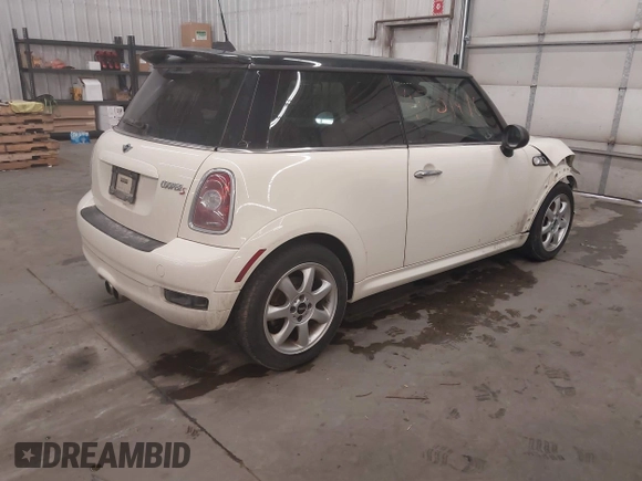 2010 MINI Hardtop S with VIN WMWMF7C50ATZ71884, listed as a IAAI auction lot 41731490 with 55,864 mi miles and . Bid and sale history available at DreamBid. Image 4.