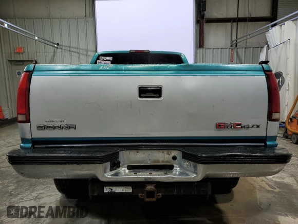 1995 GMC Sierra 1500 z VIN 2GTEK19K5S1509969, wystawiony jako Copart lot #42945545 z przebiegiem 361 334 mil mil oraz Szkody całkowita. Historia ofert i sprzedaży dostępna na DreamBid. Obrazek 6.